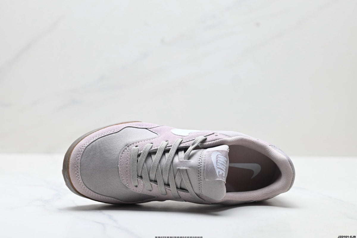 Light Gray and Pink Nike Terra Manta Sneakers - product image from the listing.