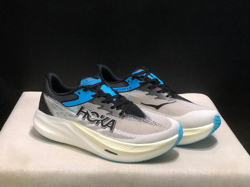 White, Black and Blue - HOKA Rocket X 3 Running Shoes - product image from the listing.