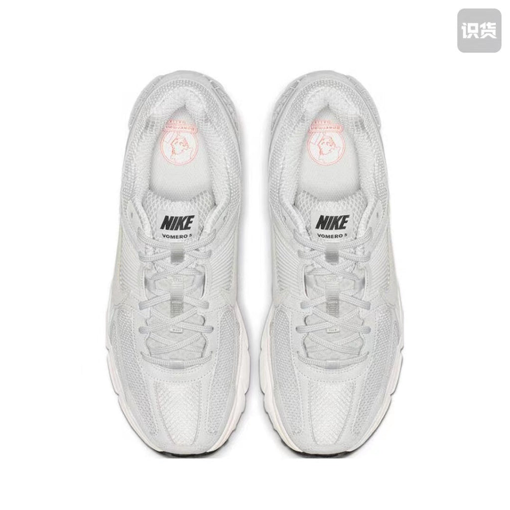 Nike Zoom Vomero 5 Sneakers in Grey and White - product image from the listing.
