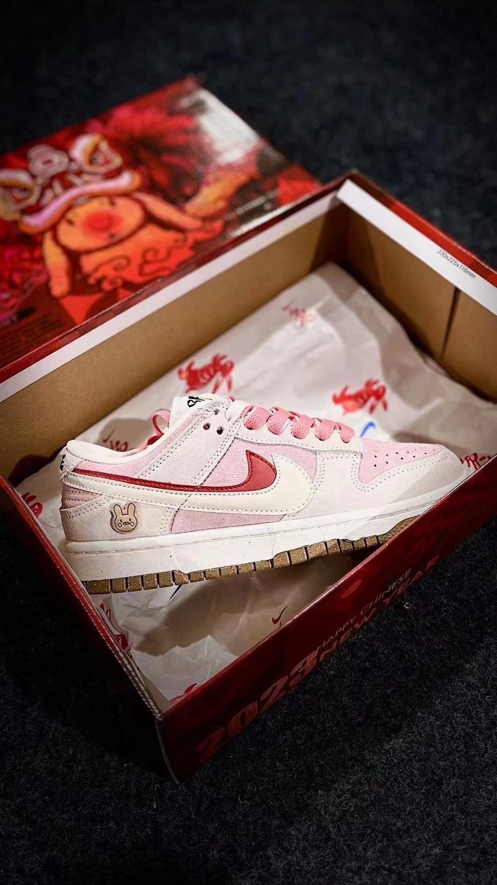 Nike Dunk Low SE Rabbit Year Sneakers in Pink White DO9457-117 - product image from the listing.