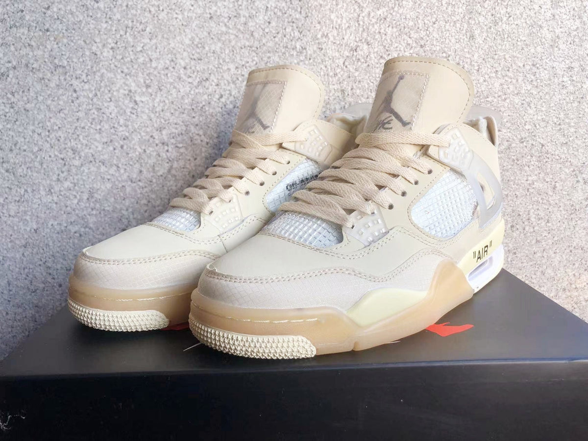 Jordan 4 Retro Sneakers in Off-White Sail - product image from the listing.