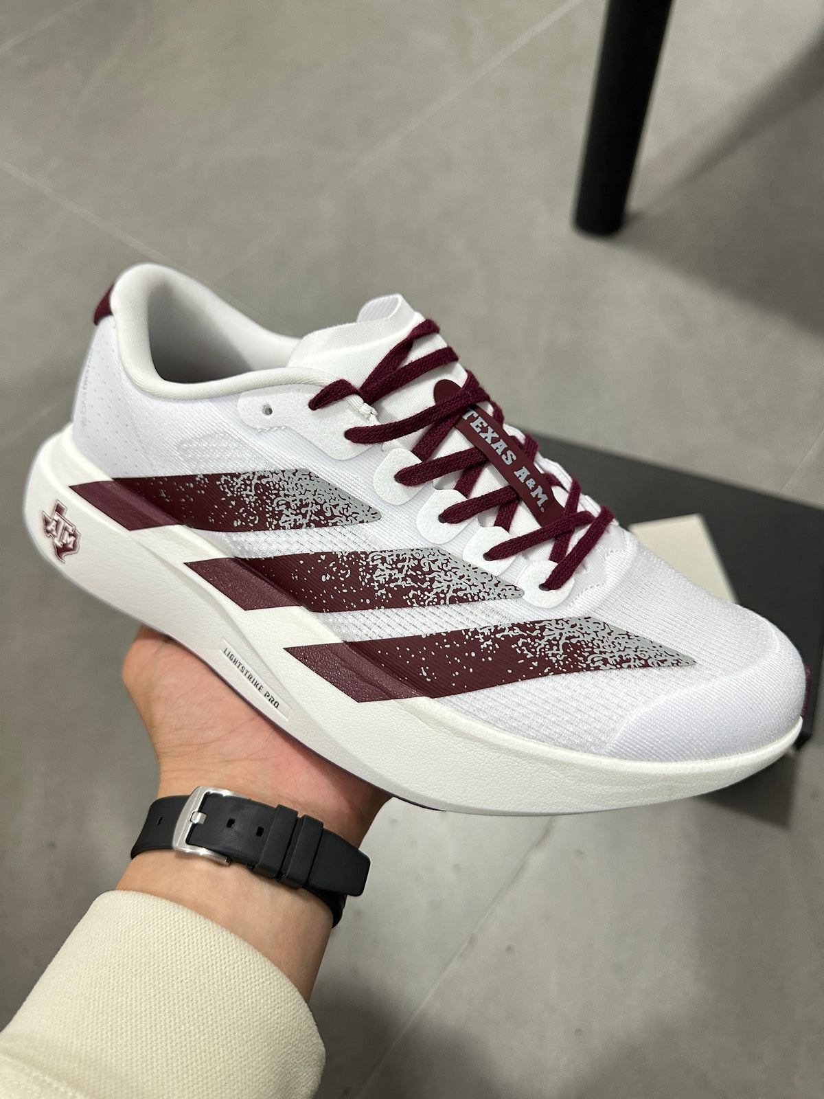 Adidas Lightstrike Pro Running Shoes in White Burgundy JQ4566 - product image from the listing.