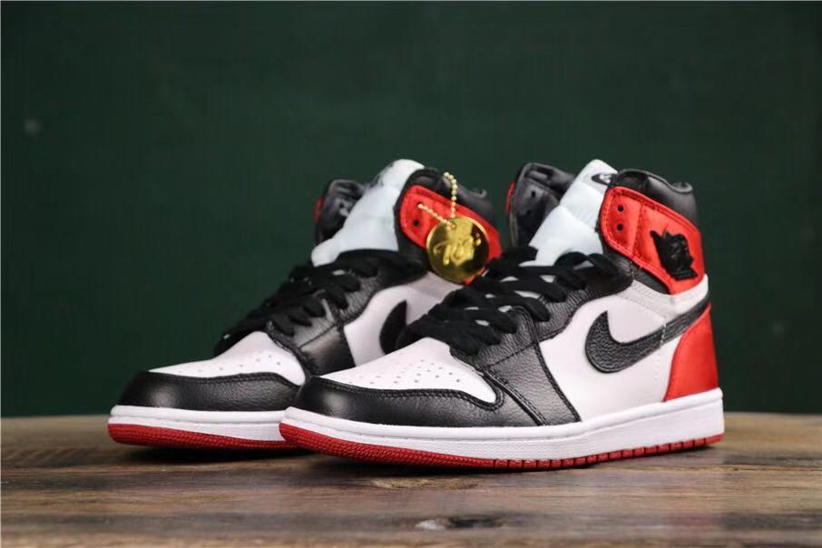 Air Jordan 1 Satin Black Toe High-Cut Sneakers - product image from the listing.
