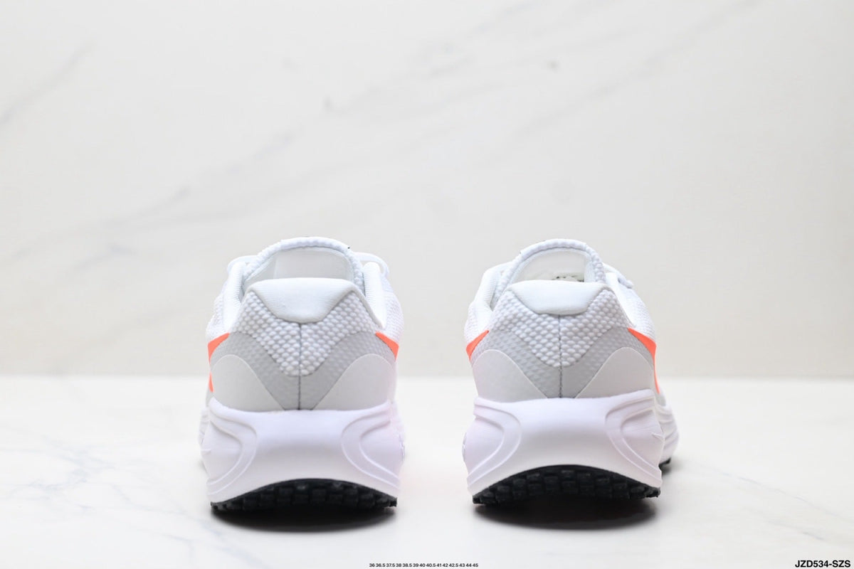 Nike Revolution 8 Running Shoes in White and Orange - product image from the listing.