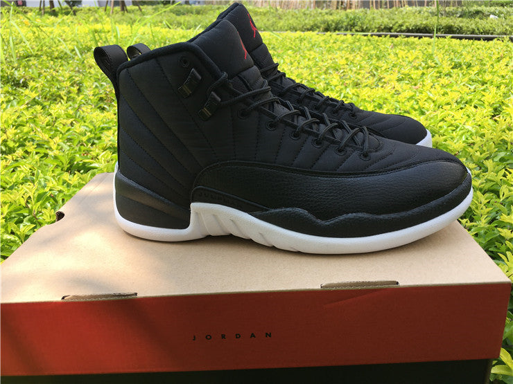 Air Jordan 12 Black Nylon High-Top Sneakers - product image from the listing.