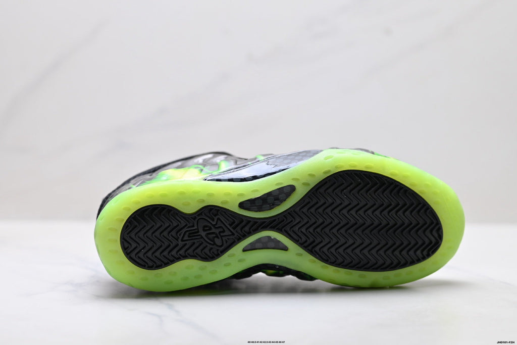 Nike Air Foamposite Huarache Basketball Sneakers in Black Green - product image from the listing.
