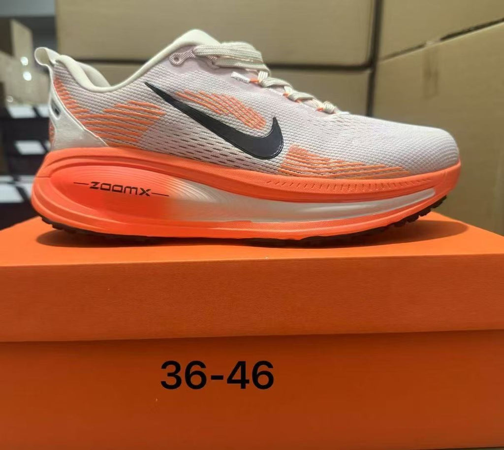 Beige and Orange Nike ZoomX Running Shoes - product image from the listing.