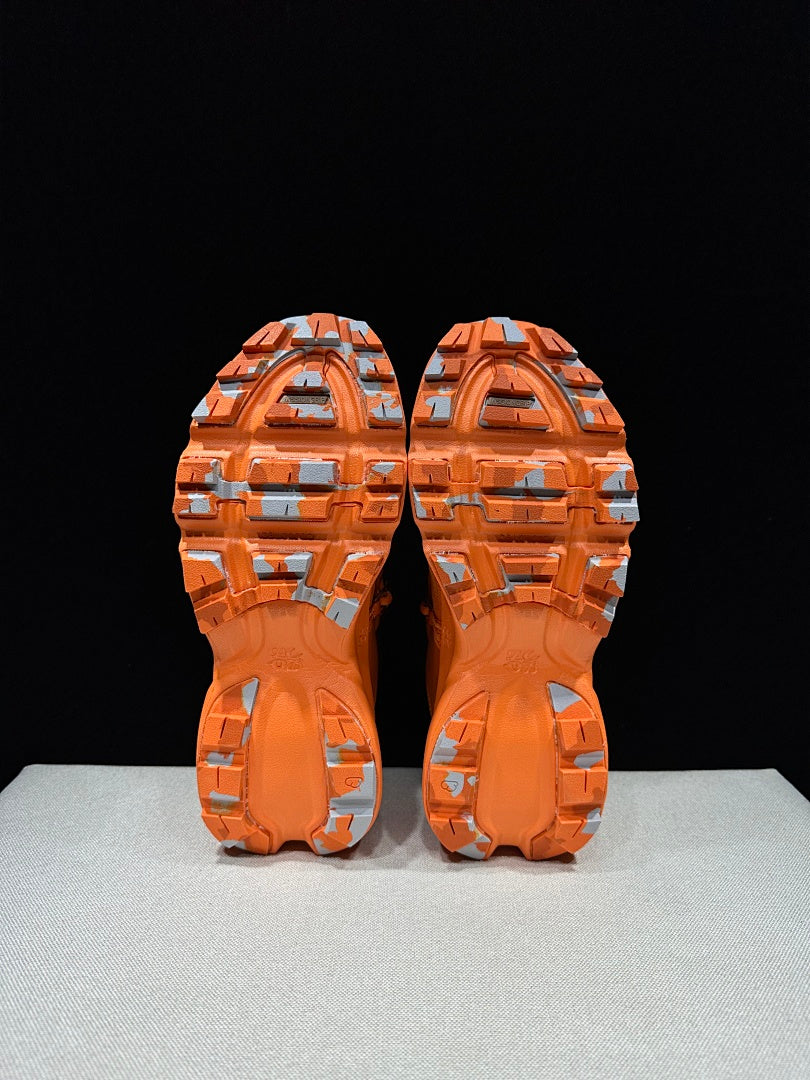 On x Loewe Cloudsurfer Orange Trail Trainers - product image from the listing.
