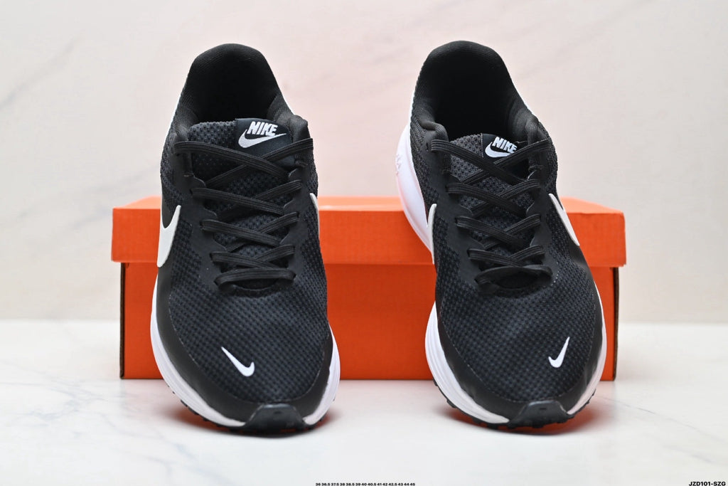 Nike Revolution 8 Running Sneakers in Black and White - product image from the listing.