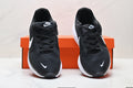 Nike Revolution 8 Running Sneakers in Black and White - product image from the listing.