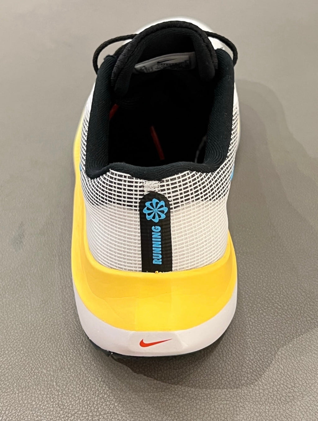 Nike Zoom Fly 5 Running Shoes in White Yellow Blue DM8974-002 - product image from the listing.