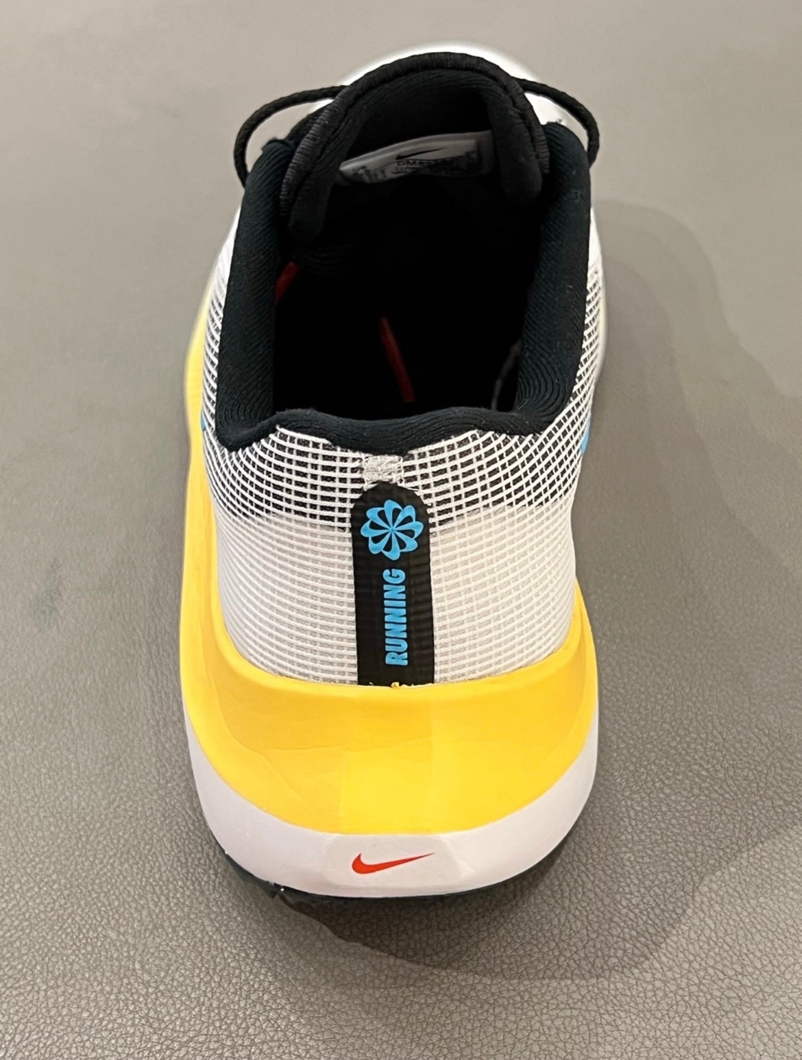 Nike Zoom Fly 5 Running Shoes in White Yellow Blue DM8974-002 - product image from the listing.