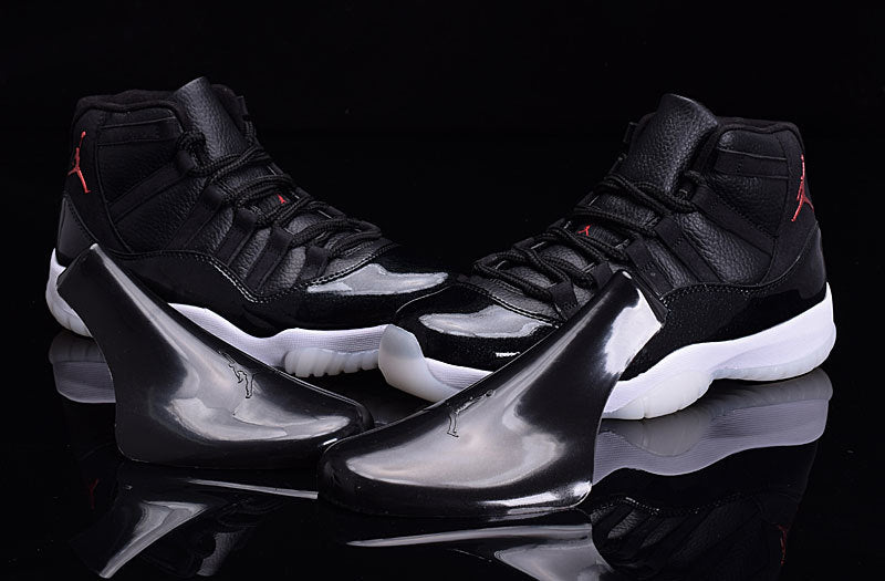 Air Jordan 11 High-Top Basketball Shoes Black White - product image from the listing.