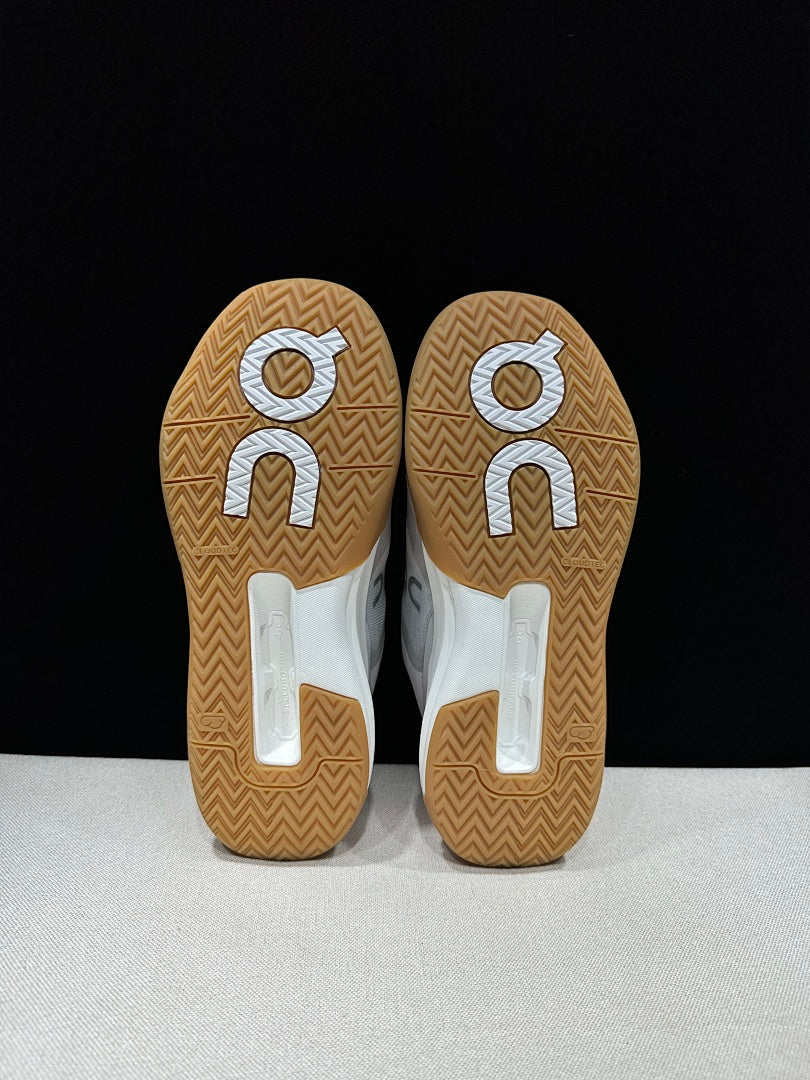 On THE ROGER Advantage Pro Tennis Shoes, in Grey and Orange - product image from the listing.