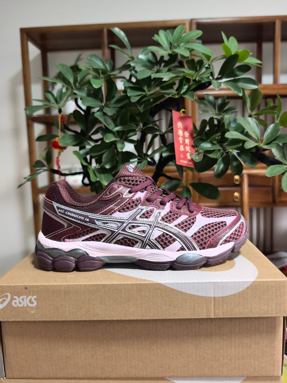 ASICS GEL-Cumulus 16 Sneakers in Sunset in Red - product image from the listing.