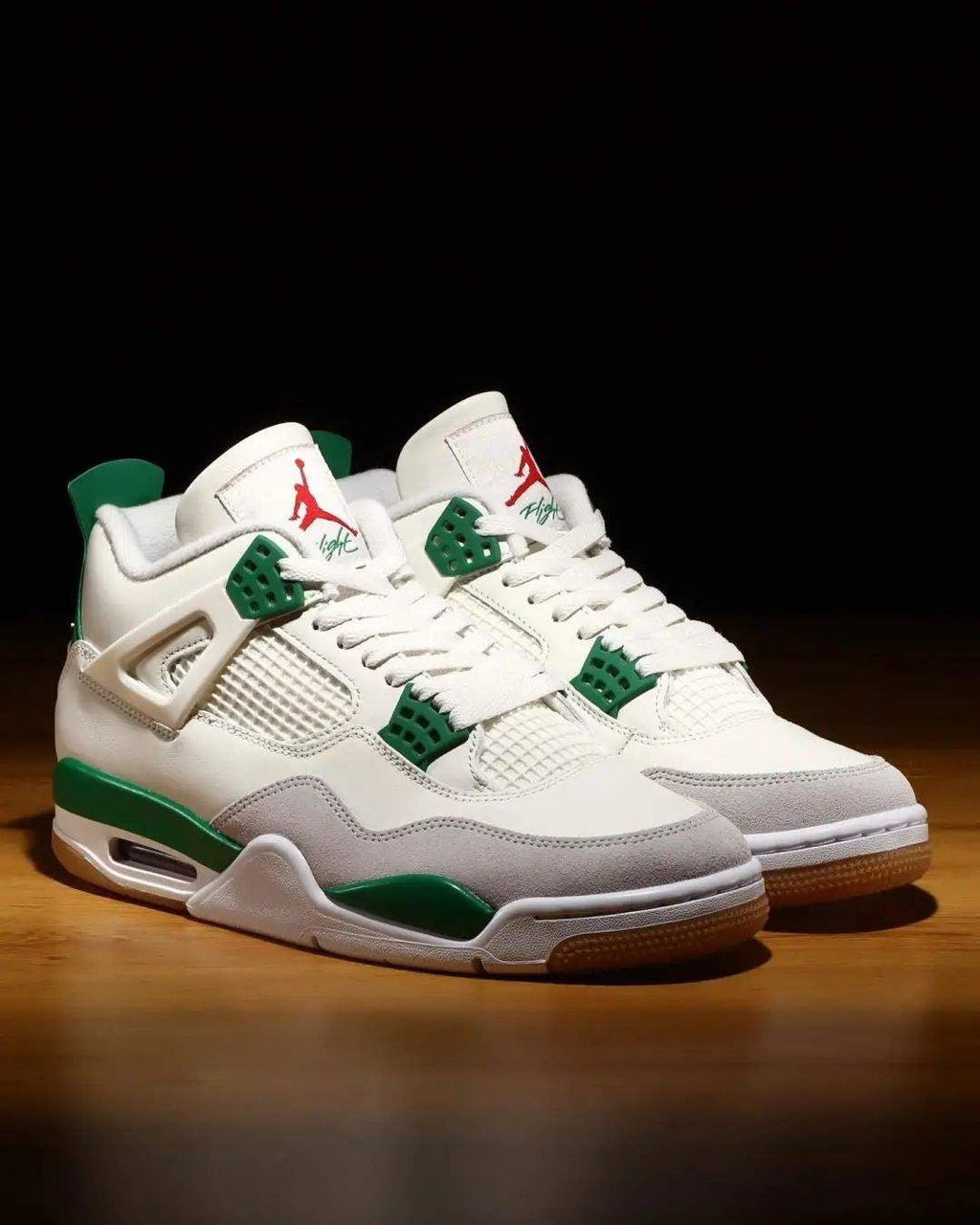 Nike SB x Air Jordan 4 Pine Sneakers in Green DR5415-103 - product image from the listing.