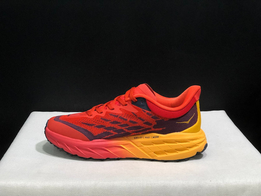 HOKA Speedgoat 5 Trail Running Shoes in Red and Yellow - product image from the listing.