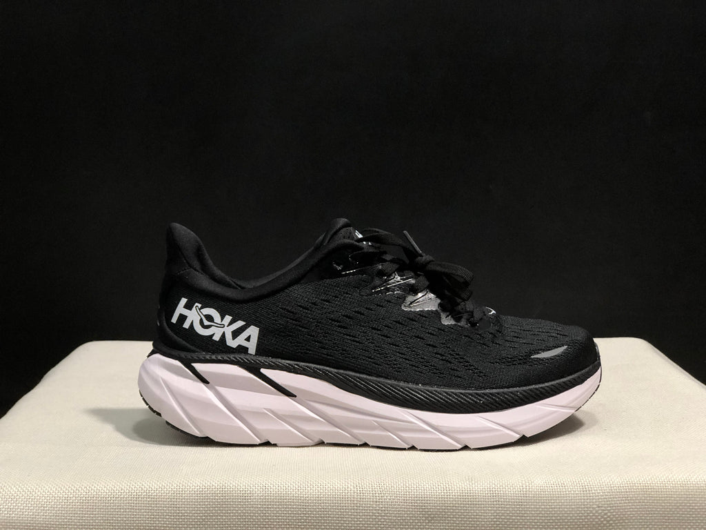 HOKA Clifton 8 Running Shoes, in Black and White - product image from the listing.