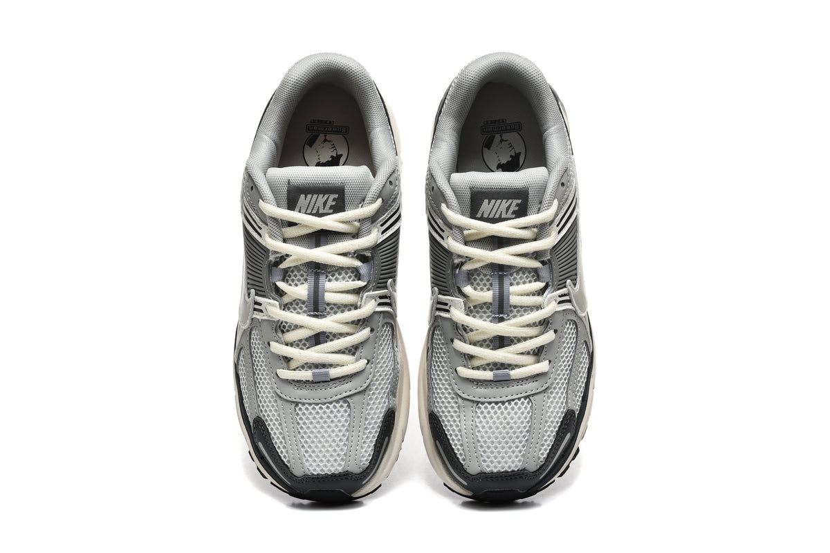 Grey and White Nike Zoom Vomero 5 Sneakers - product image from the listing.