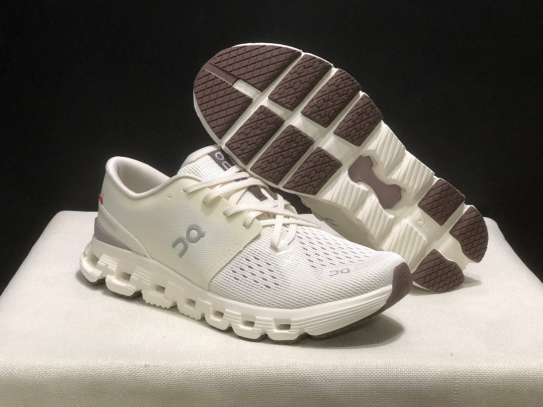 On Cloud X 4 Running Sneakers in Ivory - product image from the listing.