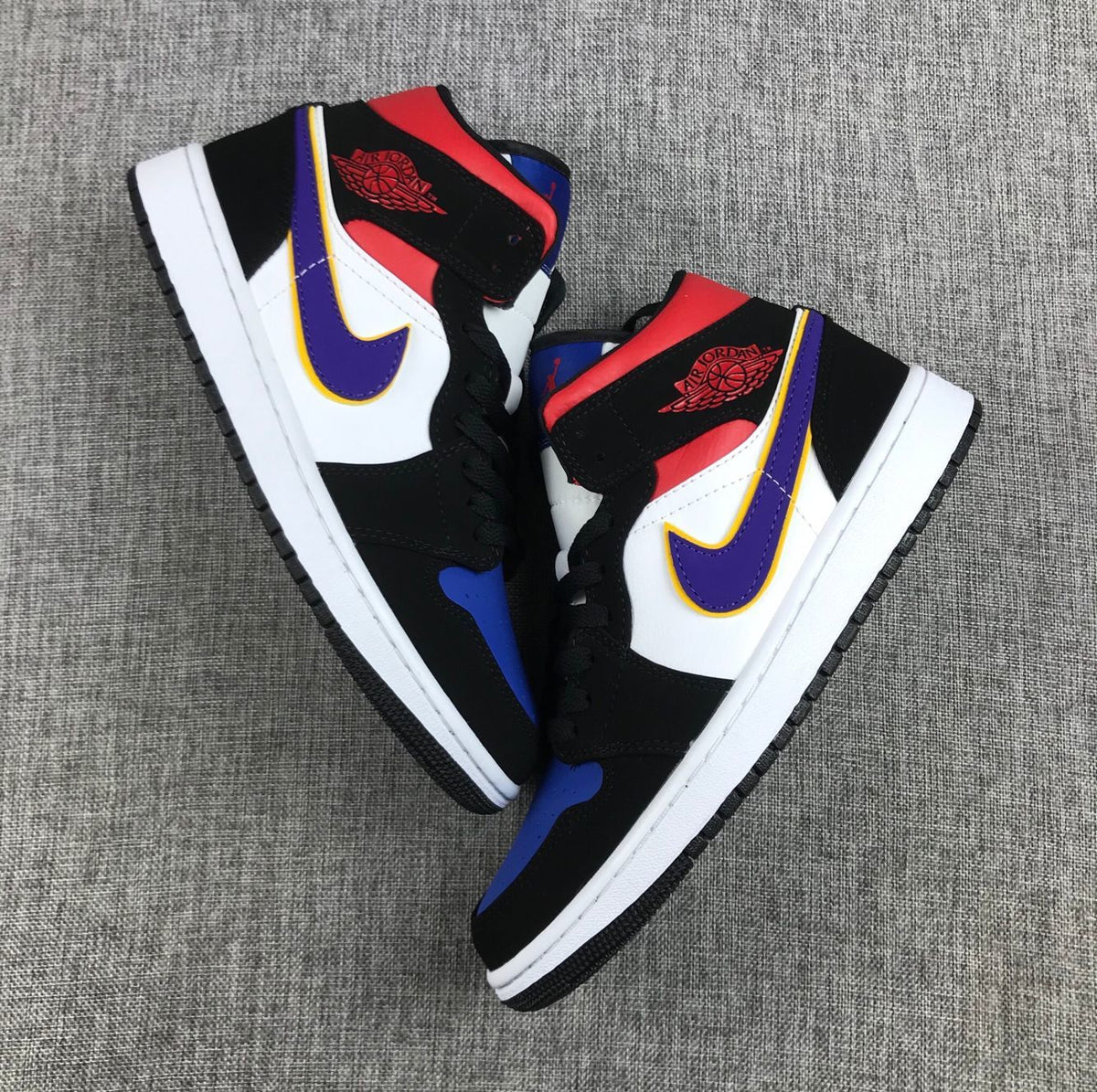 Air Jordan 1 Mid What The Sneakers in Multicolor 852542-005 - product image from the listing.