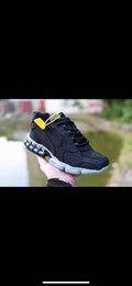 Black Mesh Lace-Up Trainers with Gray Sole - product image from the listing.