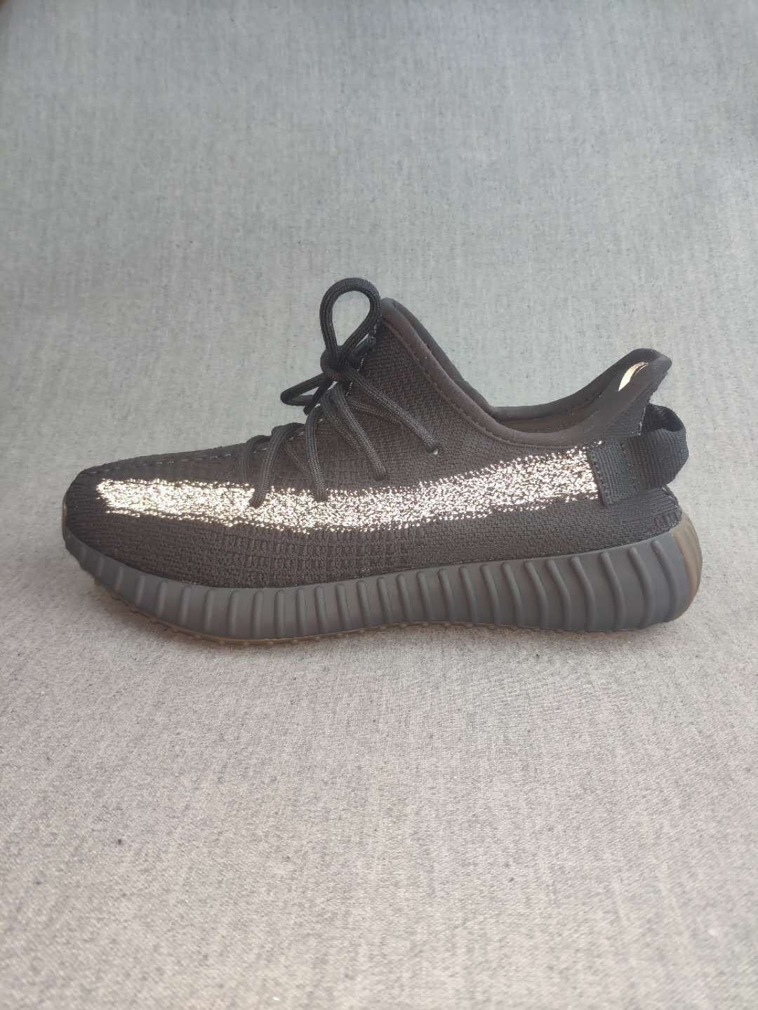 Yeezy Boost 350 V2 Reflective Sneakers in Black - product image from the listing.