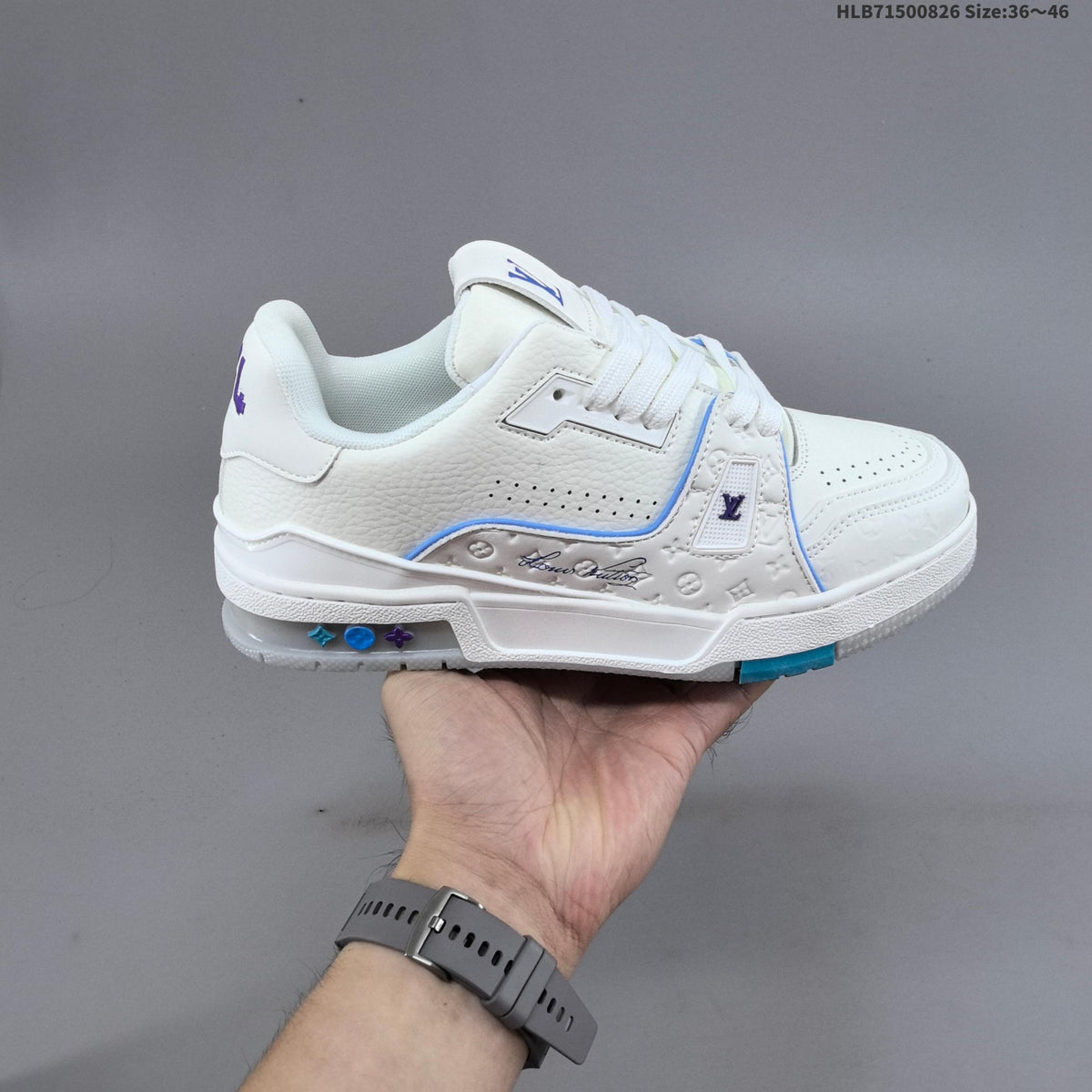 Louis Vuitton White Low-Cut Sneakers with Blue Accents - product image from the listing.