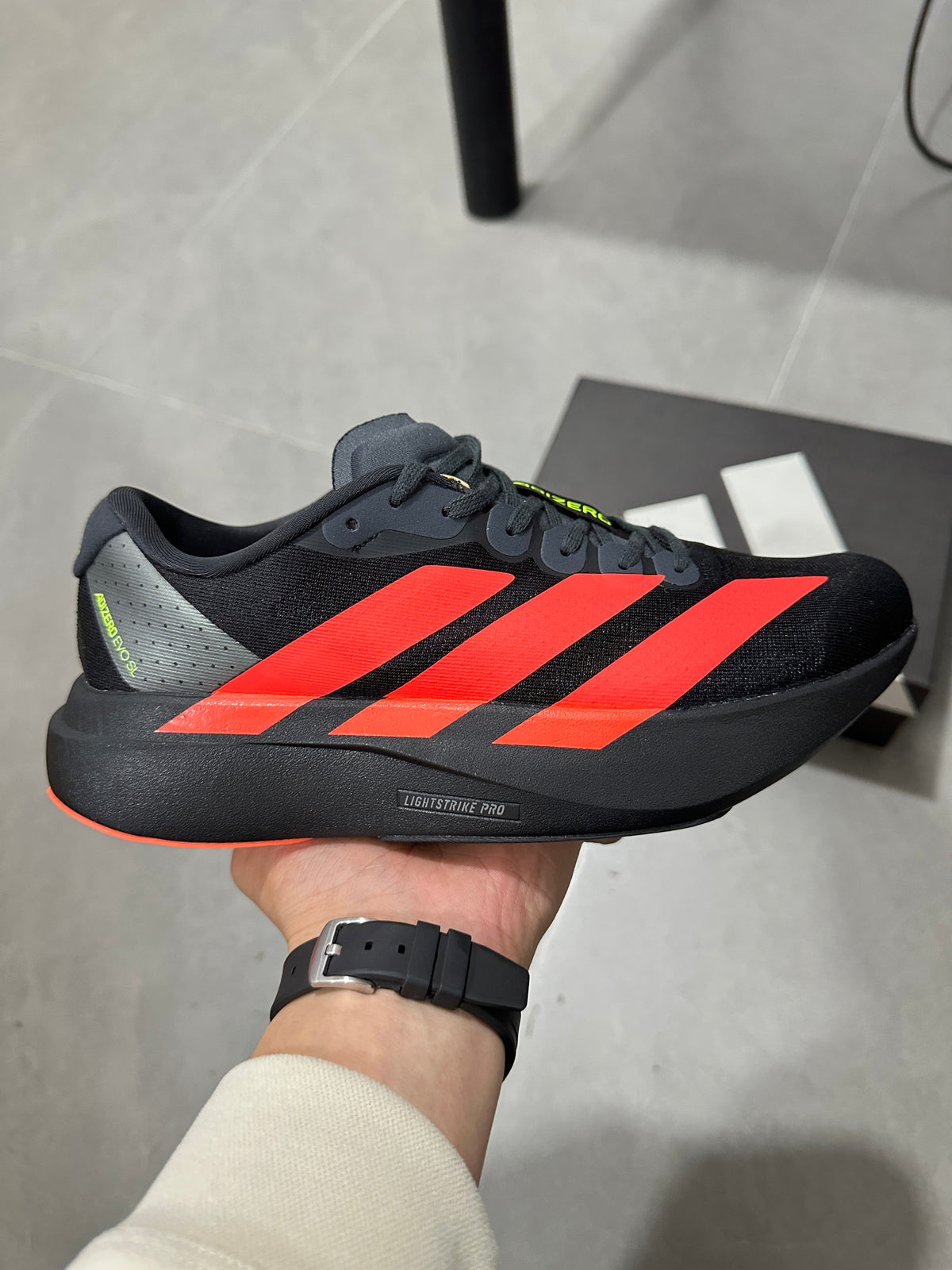 adidas Lightstrike Pro Running Shoes in Black Orange JR3414 - product image from the listing.