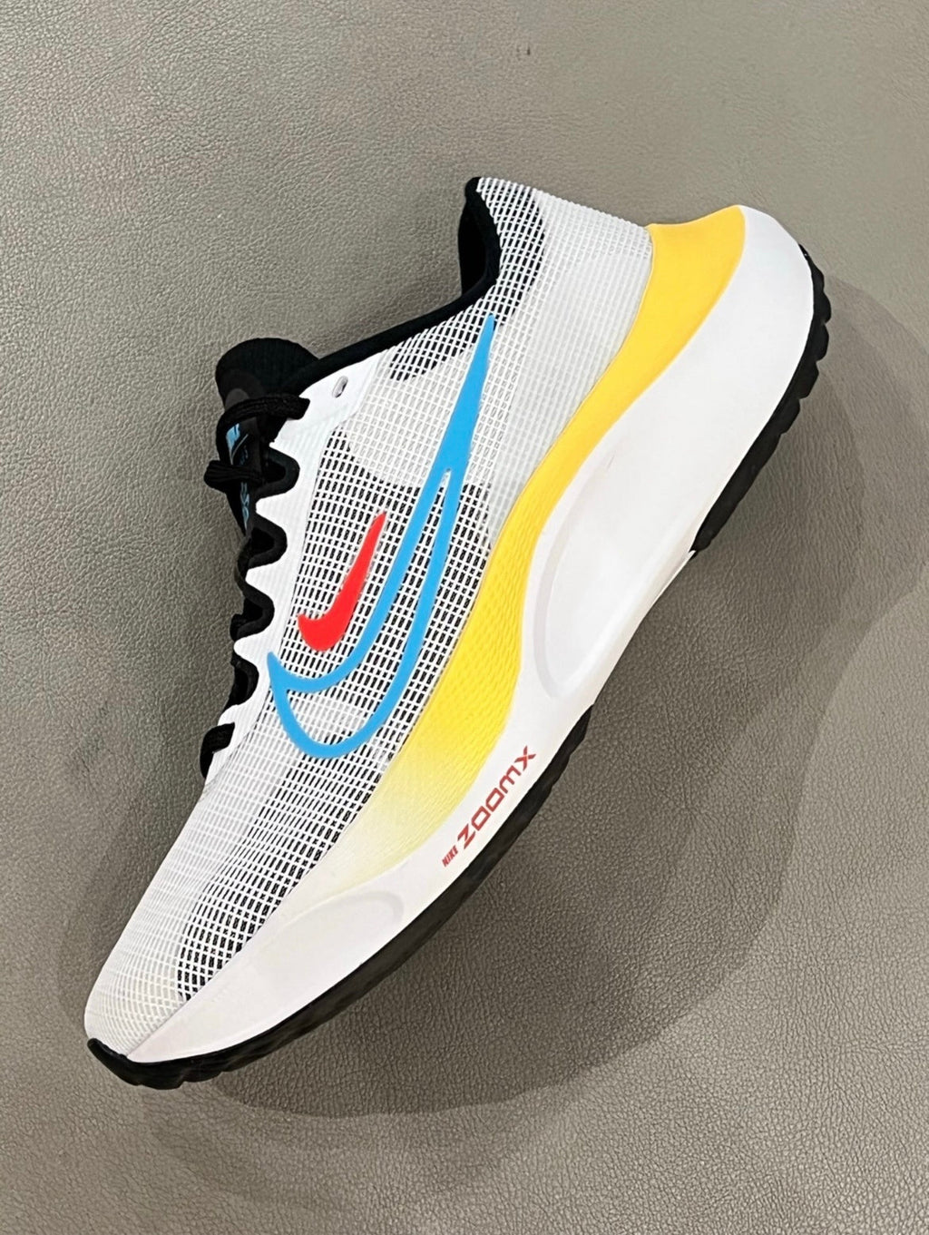 Nike Zoom Fly 5 Running Shoes in White Yellow Blue DM8974-002 - product image from the listing.