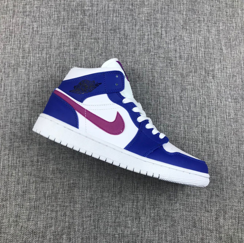 Air Jordan 1 Mid Sneakers in Blue Pink 554724-451 - product image from the listing.