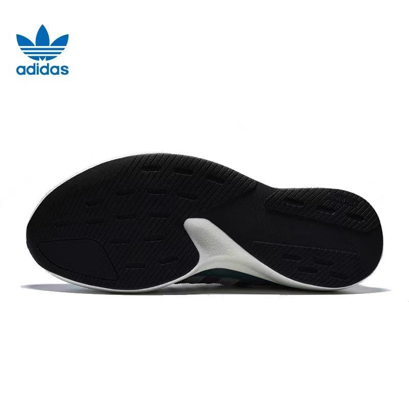 Adidas White and Green Platform Trainers with Mauve Stripes - product image from the listing.