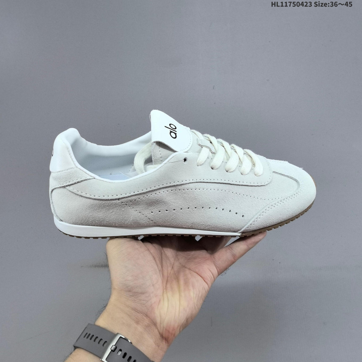 Black and Ivory Alo Yoga Sunset Sneaker - product image from the listing.