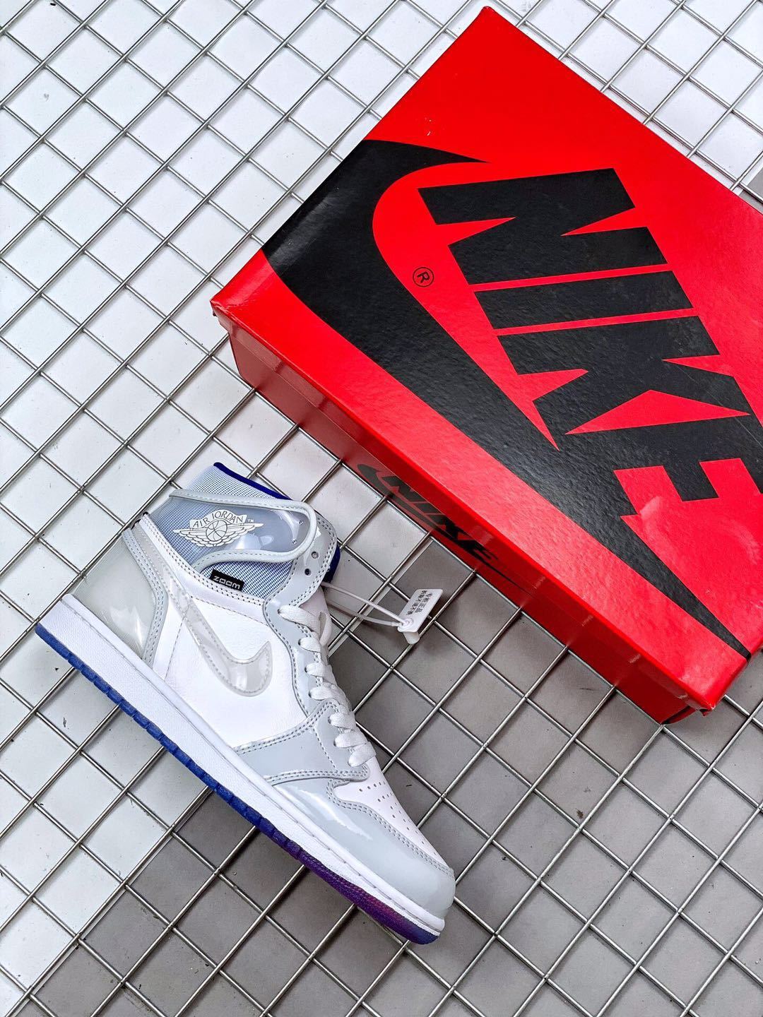 Air Jordan 1 High Zoom R2T Sneakers White Grey Blue - product image from the listing.