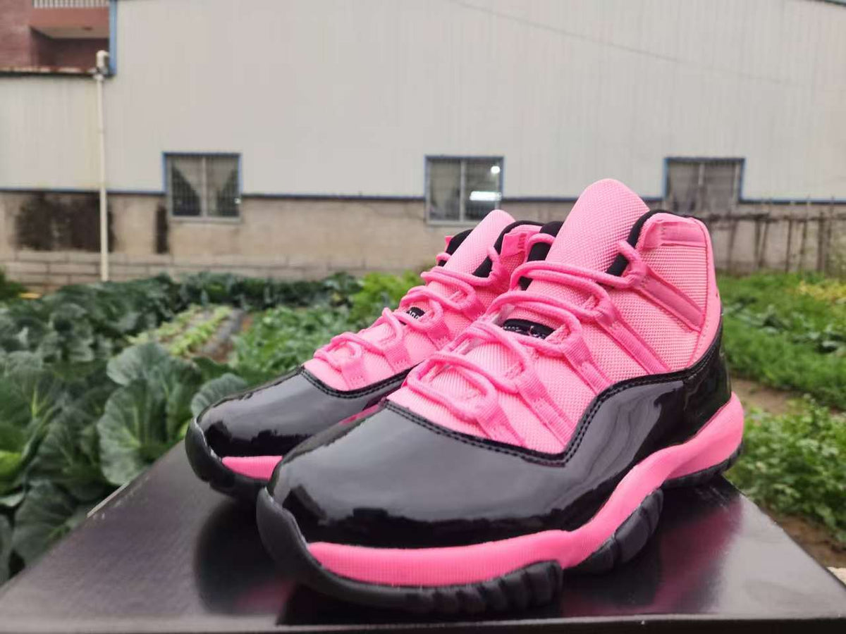 "Pink/Black" Air Jordan 11 Retro Sneaker - product image from the listing.