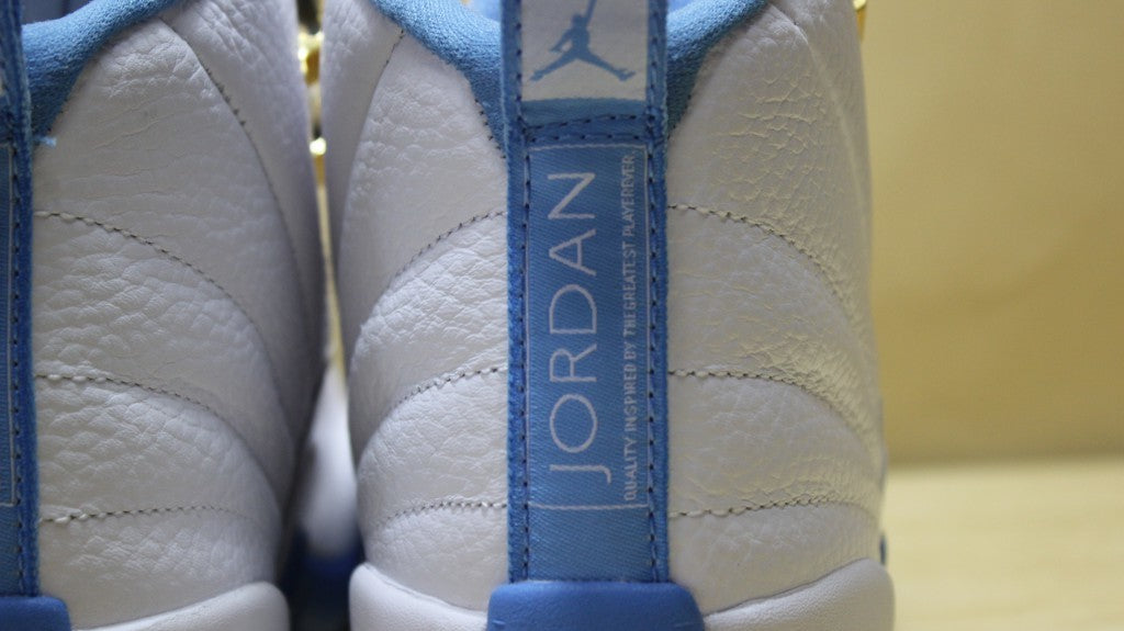 Air Jordan 12 High-Top Sneakers in University Blue 510815-127 - product image from the listing.