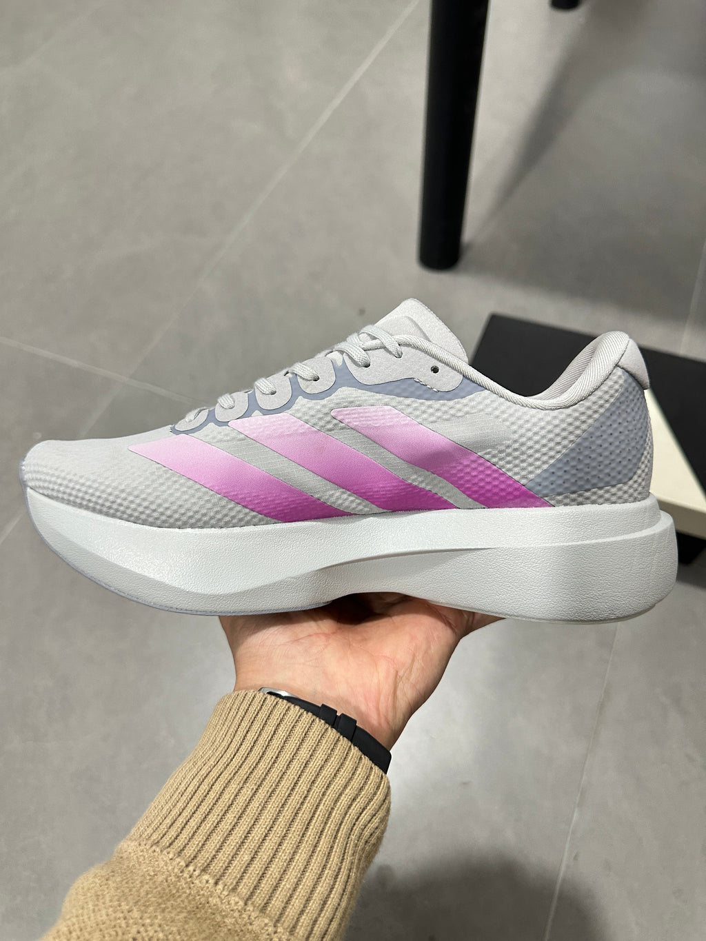 adidas Adizero Lightstrike Pro Running Shoes, in Gray and Pink - product image from the listing.