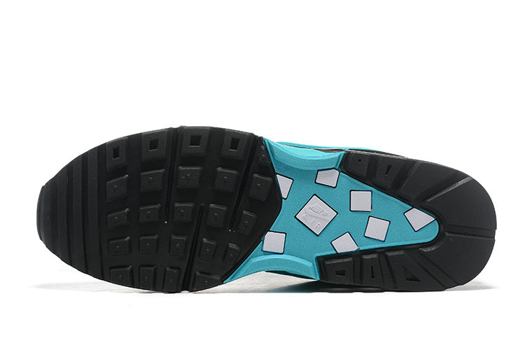 Nike Air Max Sneakers in Black and Turquoise - product image from the listing.