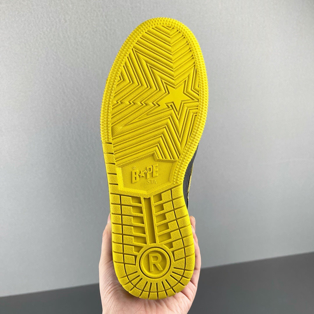 A Bathing Ape SK8 Sta Sneakers in Black Yellow - product image from the listing.
