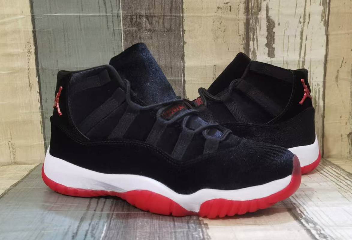 "72-10" Air Jordan 11 Retro Black/Red Velvet - product image from the listing.