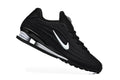 Nike Low-Top Sneakers in Black and White - product image from the listing.
