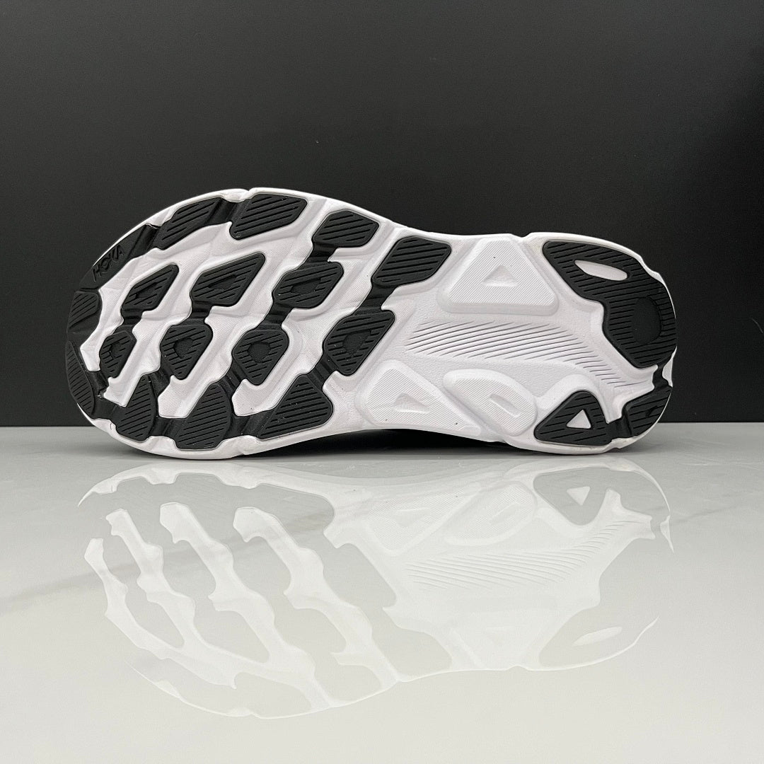 HOKA Clifton 9 Running Shoes in Black and White - product image from the listing.