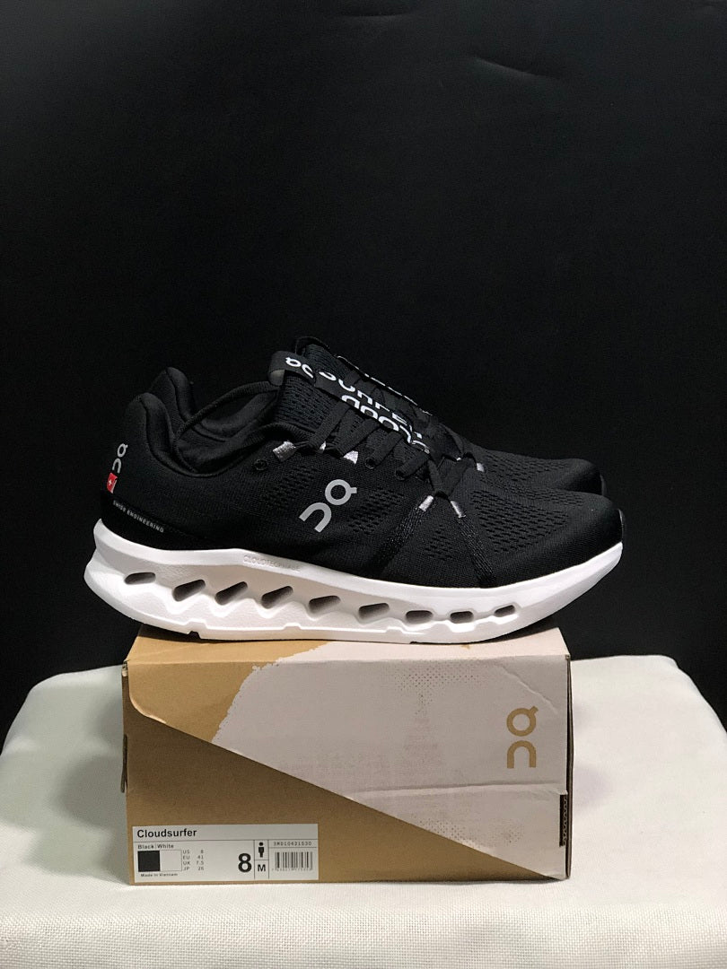 On Cloudsurfer Running Shoes in Black and White - product image from the listing.