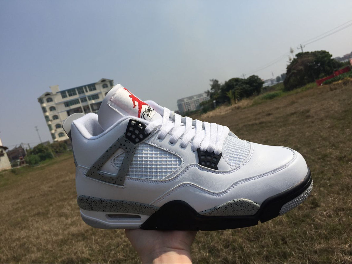 Men's Jordan 4 Retro White Cement Sneakers - product image from the listing.