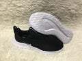 Nike Low-Top Sneakers in Black and White Knit - product image from the listing.