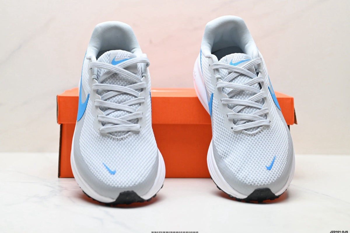 Nike Revolution 8 Running Shoes, in White and Blue - product image from the listing.
