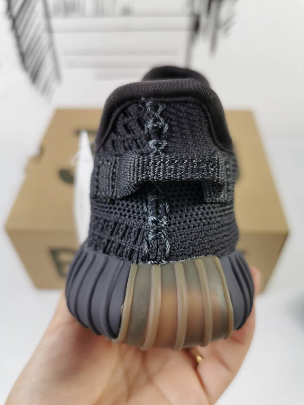 Black and Gum Yeezy 350 V2 Kids Sneakers - product image from the listing.