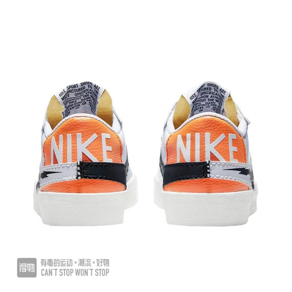 Nike Blazer Low 07 Sneakers in White Orange Black - product image from the listing.