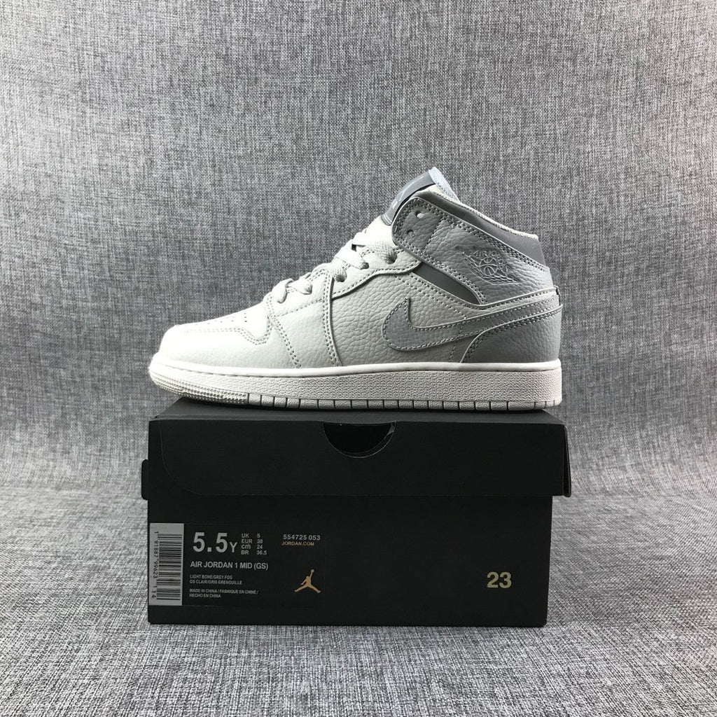 White and Grey Air Jordan 1 Mid Sneakers - product image from the listing.