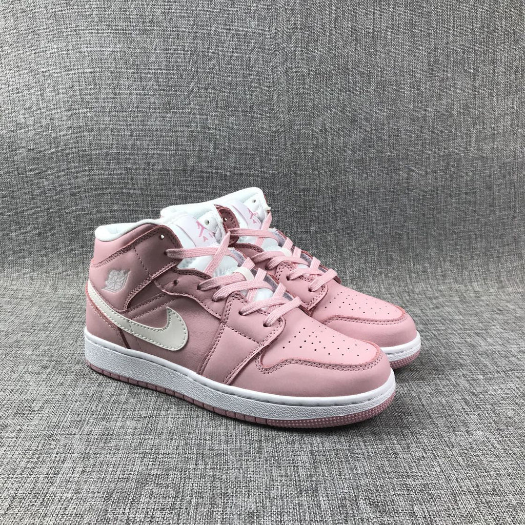 Women's Jordan 1 Mid Pink Sneakers 555112-100 - product image from the listing.